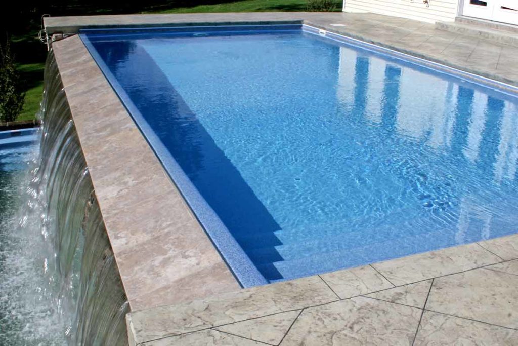 fiberglass inground pools with spillover edge