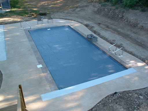 automatic pool covers over a pool