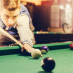 4 Family-Friendly Games to Play on a Pool Table