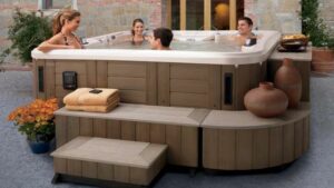 a group of people enjoy a soak after hot tub installation and set up